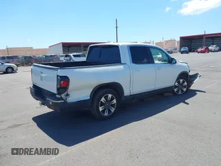 2019 Honda Ridgeline RTL with VIN 5FPYK2F52KB004624, listed as a IAAI auction lot 41789190 with 51,834 mi miles and . Bid and sale history available at DreamBid. Image 4.