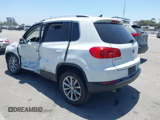 2017 Volkswagen Tiguan Wolfsburg Edition with VIN WVGRV7AX4HW502964, listed as a IAAI auction lot 42538054 with 104,530 mi miles and . Bid and sale history available at DreamBid. Image 3.