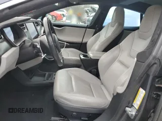 2015 Tesla Model S 85D with VIN 5YJSA1H4XFF096717, listed as a Copart auction lot 84732464 with Not Provided miles and Salvage Title. Bid and sale history available at carsss.com. Image 7.