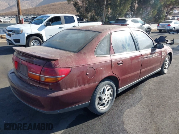 2002 Saturn LS z VIN 1G8JU54F72Y519923, wystawiony jako IAAI lot #40676524 z przebiegiem Nie podano mil oraz . Historia ofert i sprzedaży dostępna na DreamBid. Obrazek 4.