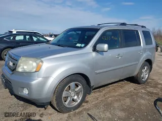 2011 Honda Pilot EX with VIN 5FNYF4H42BB040455, listed as a IAAI auction lot 42039366 with 169,469 mi miles. Bid and sale history available at carsss.com. Image 2.