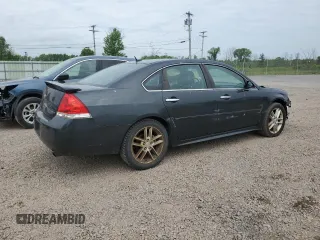 2014 Chevrolet Impala LTZ with VIN 2G1WC5E3XE1185115, listed as a Copart auction lot 60690785 with 119,947 mi miles and Salvage title. Bid and sale history available at DreamBid. Image 3.