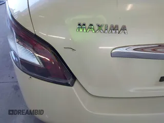 2014 Nissan Maxima SV z VIN 1N4AA5AP5EC482907, wystawiony jako IAAI lot #41885801 z przebiegiem 186 364 mil mil oraz . Historia ofert i sprzedaży dostępna na DreamBid. Obrazek 14.