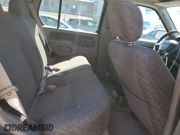 2001 Nissan Xterra XE with VIN 5N1ED28T01C522269, listed as a Copart auction lot 56997515 with 103,800 mi miles and Salvage title. Bid and sale history available at DreamBid. Image 11.
