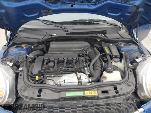 2007 MINI Hardtop S with VIN WMWMF73527TL91061, listed as a IAAI auction lot 41842104 with 65,259 mi miles and . Bid and sale history available at DreamBid. Image 10.