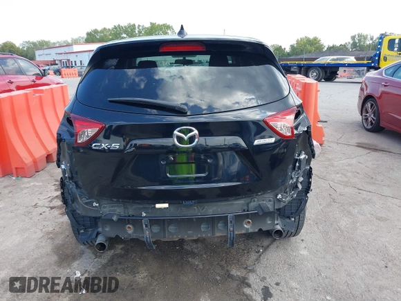 2016 Mazda CX-5 Touring with VIN JM3KE2CY5G0653108, listed as a IAAI auction lot 37717249 with 90,704 mi miles and . Bid and sale history available at DreamBid. Image 17.