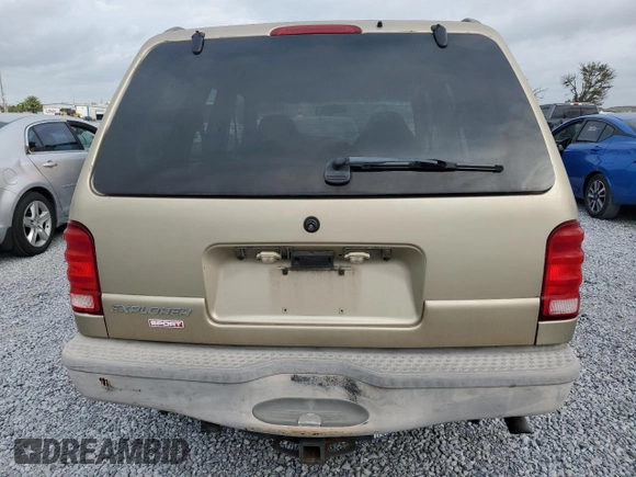 2002 Ford Explorer Sport Value with VIN 1FMYU60EX2UC31677, listed as a Copart auction lot 46415785 with 104,684 mi miles and Salvage title. Bid and sale history available at DreamBid. Image 6.
