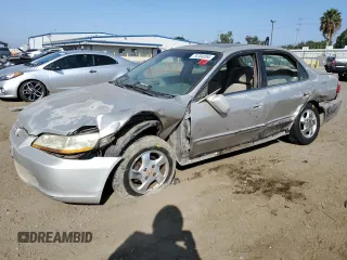 1998 Honda Accord EX z VIN 1HGCG555XWA040830, wystawiony jako Copart lot #74704554 z przebiegiem 253 788 mil mil oraz Szkoda całkowita • Salvage title. Historia ofert i sprzedaży dostępna na DreamBid. Obrazek 1.