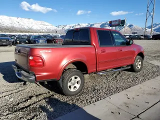 2002 Ford F-150 XLT with VIN 1FTRW08L02KB81578, listed as a Copart auction lot 47069215 with 201,148 mi miles and Salvage Title. Bid and sale history available at carsss.com. Image 3.