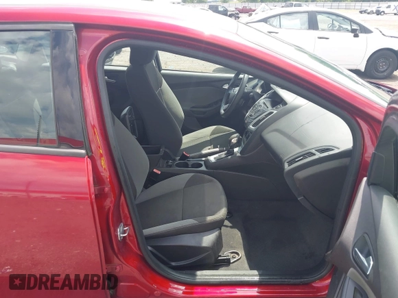 2013 Ford Focus SE z VIN 1FADP3F29DL149377, wystawiony jako IAAI lot #42472584 z przebiegiem 79 402 mil mil oraz . Historia ofert i sprzedaży dostępna na DreamBid. Obrazek 5.