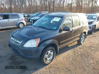 2004 Honda CR-V LX with VIN SHSRD784X4U207801, listed as a IAAI auction lot 41882897 with 246,541 mi miles and . Bid and sale history available at carsss.com. Image 6.