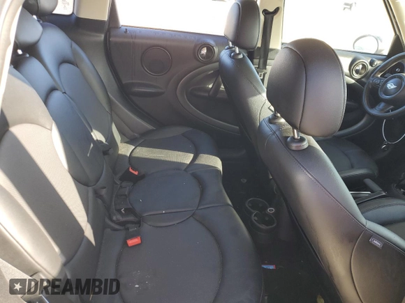 2016 MINI Countryman S with VIN WMWZC5C51GWU01290, listed as a Copart auction lot 77684384 with 106,811 mi miles and Salvage Title. Bid and sale history available at DreamBid. Image 10.