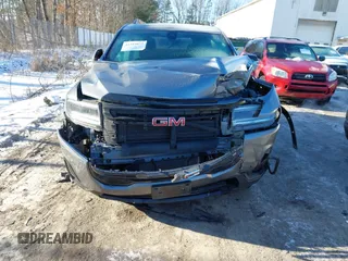 2021 GMC Acadia SLE with VIN 1GKKNRLS9MZ100776, listed as a IAAI auction lot 41384075 with 47,304 mi miles. Bid and sale history available at carsss.com. Image 12.