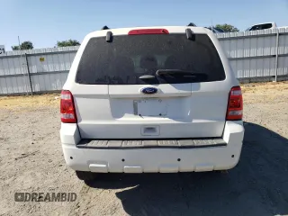 2012 Ford Escape XLT z VIN 1FMCU9DG5CKC08988, wystawiony jako Copart lot #60741765 z przebiegiem 93 114 mil mil oraz Czysty tytuł • Clean title. Historia ofert i sprzedaży dostępna na DreamBid. Obrazek 6.