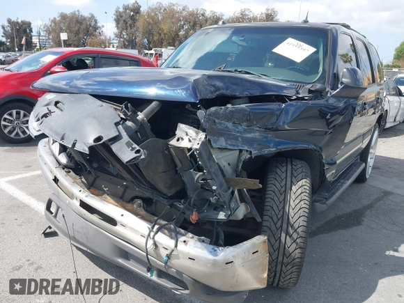 2005 Chevrolet Tahoe Z71 z VIN 1GNEC13T95R192599, wystawiony jako IAAI lot #41955397 z przebiegiem 179 292 mil mil oraz . Historia ofert i sprzedaży dostępna na DreamBid. Obrazek 6.
