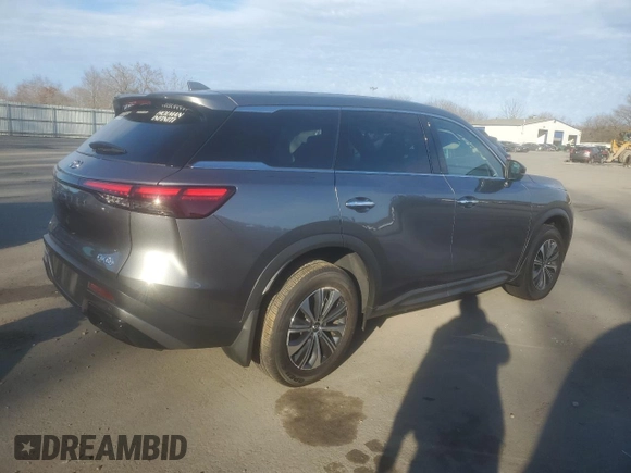 2024 Infiniti QX60 Pure with VIN 5N1DL1ESXRC342409, listed as a Copart auction lot 86615684 with 12,602 mi miles and Salvage title. Bid and sale history available at DreamBid. Image 3.