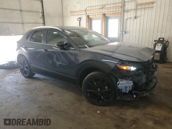 2023 Mazda CX-30 S Preferred with VIN 3MVDMBCM0PM575057, listed as a Copart auction lot 63506665 with 47,556 mi miles and Salvage title. Bid and sale history available at DreamBid. Image 4.