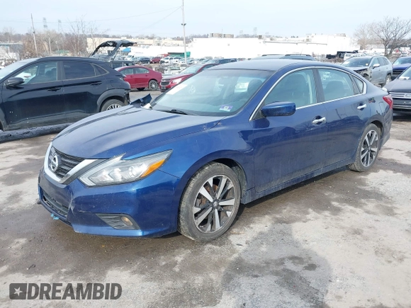2018 Nissan Altima 2.5 SR with VIN 1N4AL3AP3JC101421, listed as a IAAI auction lot 41482620 with 101,431 mi miles. Bid and sale history available at carsss.com. Image 17.