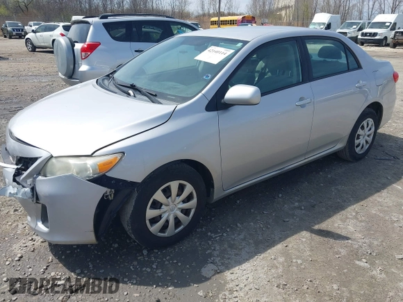2011 Toyota Corolla L with VIN 2T1BU4EE0BC547772, listed as a IAAI auction lot 42140114 with 180,271 mi miles. Bid and sale history available at carsss.com. Image 2.