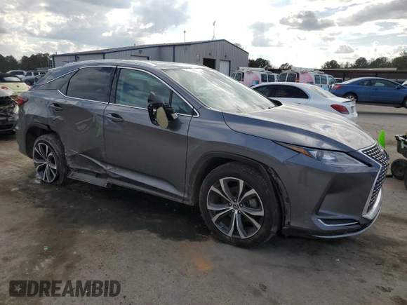 2021 Lexus RX with VIN 2T2HZMDA9MC301408, listed as a Copart auction lot 44231785 with 86,444 mi miles and Salvage Title. Bid and sale history available at carsss.com. Image 4.