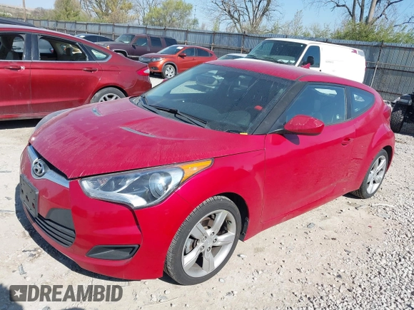2014 Hyundai Veloster with VIN KMHTC6AD2EU214847, listed as a IAAI auction lot 42067728 with 77,421 mi miles. Bid and sale history available at carsss.com. Image 2.