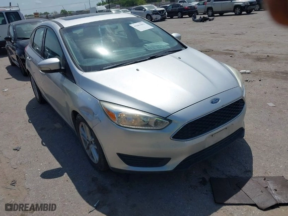 2016 Ford Focus SE with VIN 1FADP3K29GL269691, listed as a IAAI auction lot 42061051 with 100,692 mi miles. Bid and sale history available at carsss.com. Image 1.
