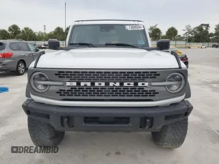 2021 Ford Bronco с VIN 1FMEE5DH4MLA88068, выставлен на аукционе Copart как лот 74888594 с пробегом Не указан миль и На запчасти • Non repairable. История ставок и продаж доступна на DreamBid. Изображение 5.