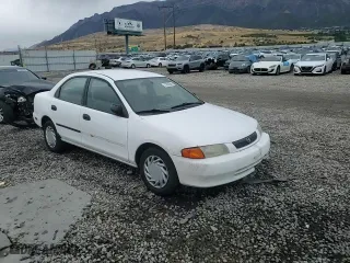 1998 Mazda Protege DX with VIN JM1BC1415W0202950, listed as a Copart auction lot 71992944 with 98,689 mi miles and Salvage Title. Bid and sale history available at carsss.com. Image 10.
