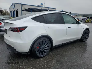 2022 Tesla Model Y Performance with VIN 7SAYGDEF3NF390848, listed as a Copart auction lot 49441025 with 42,488 mi miles and Salvage Title. Bid and sale history available at DreamBid. Image 3.
