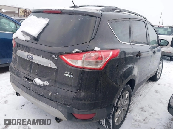 2013 Ford Escape SEL with VIN 1FMCU9H95DUB57946, listed as a IAAI auction lot 41416862 with 91,791 mi miles. Bid and sale history available at carsss.com. Image 4.