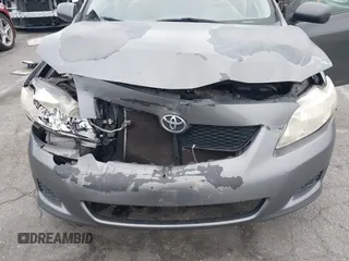 2009 Toyota Corolla with VIN JTDBL40E899066243, listed as a IAAI auction lot 41884292 with 219,338 mi miles. Bid and sale history available at carsss.com. Image 6.