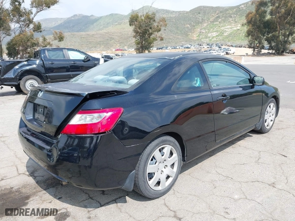 2010 Honda Civic Cpe LX with VIN 2HGFG1B60AH536376, listed as a IAAI auction lot 41905320 with 121,602 mi miles. Bid and sale history available at carsss.com. Image 4.