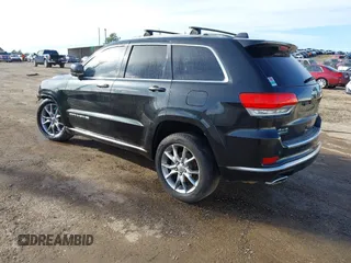 2015 Jeep Grand Cherokee Summit with VIN 1C4RJFJMXFC878812, listed as a IAAI auction lot 41637279 with 149,488 mi miles. Bid and sale history available at carsss.com. Image 3.