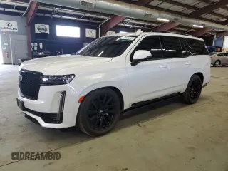 2021 Cadillac Escalade Sport z VIN 1GYS4FKL0MR329672, wystawiony jako Copart lot #49421475 z przebiegiem 87 078 mil mil oraz Czysty tytuł • Clean title. Historia ofert i sprzedaży dostępna na DreamBid. Obrazek 1.