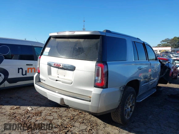 2018 GMC Yukon Denali with VIN 1GKS1CKJ9JR241330, listed as a IAAI auction lot 41180538 with 100,300 mi miles. Bid and sale history available at carsss.com. Image 4.