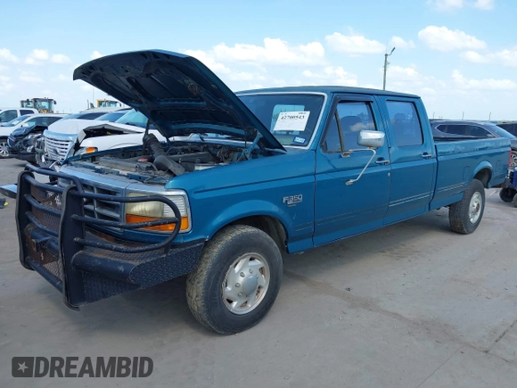 1994 Ford F-350 with VIN 1FTJW35K2REA09247, listed as a IAAI auction lot 42700543 with 157,000 mi miles and . Bid and sale history available at DreamBid. Image 2.
