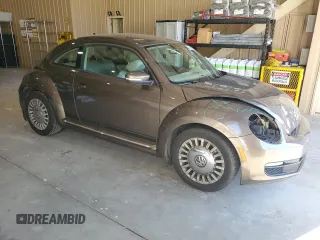 2014 Volkswagen Beetle 2.5L w/Sun with VIN 3VWJP7AT0EM632824, listed as a Copart auction lot 87279494 with Not Provided miles and Salvage Title. Bid and sale history available at DreamBid. Image 4.