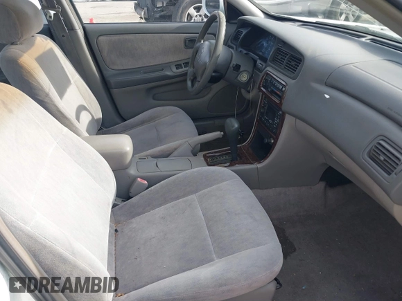 1998 Nissan Altima XE with VIN 1N4DL01D8WC165818, listed as a IAAI auction lot 41658156 with 184,843 mi miles. Bid and sale history available at carsss.com. Image 5.
