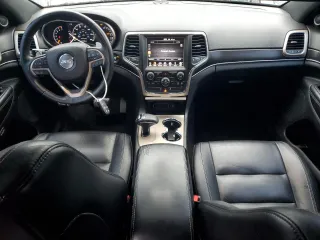2014 Jeep Grand Cherokee Limited with VIN 1C4RJFBG2EC233725, listed as a Copart auction lot 58524505 with 216,798 mi miles and Salvage title. Bid and sale history available at DreamBid. Image 8.