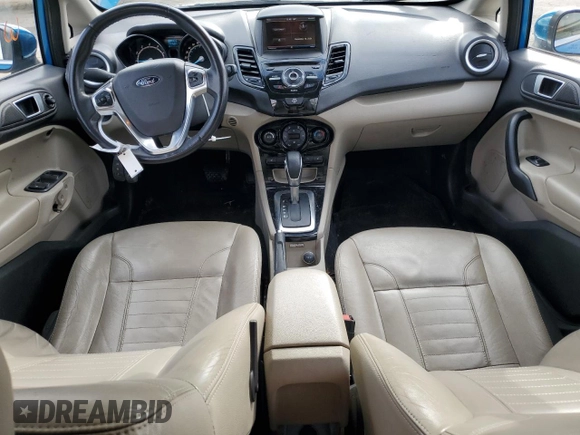 2015 Ford Fiesta Titanium z VIN 3FADP4FJ7FM120958, wystawiony jako Copart lot #85260204 z przebiegiem 144 587 mil mil oraz Szkoda całkowita • Salvage title. Historia ofert i sprzedaży dostępna na DreamBid. Obrazek 8.