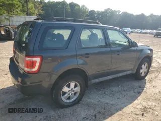 2009 Ford Escape XLS with VIN 1FMCU02739KD07929, listed as a Copart auction lot 64861745 with 144,914 mi miles and Clean title. Bid and sale history available at DreamBid. Image 3.