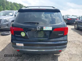 2017 Honda Pilot Touring with VIN 5FNYF5H99HB037126, listed as a IAAI auction lot 42275048 with 164,289 mi miles and . Bid and sale history available at DreamBid. Image 16.