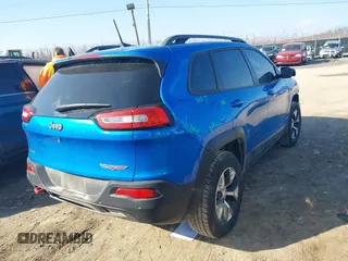 2018 Jeep Cherokee Trailhawk with VIN 1C4PJMBB2JD569069, listed as a IAAI auction lot 41651023 with 80,201 mi miles. Bid and sale history available at carsss.com. Image 4.