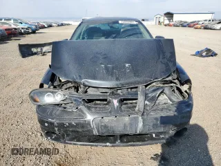 2001 Pontiac Grand Am GT with VIN 1G2NW12E31M584119, listed as a Copart auction lot 76099984 with 293,559 mi miles and Clean Title. Bid and sale history available at carsss.com. Image 5.