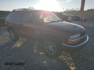 2001 Chevrolet Blazer LS z VIN 1GNCT18W51K123809, wystawiony jako Copart lot #86491294 z przebiegiem 211 514 mil mil oraz Szkoda całkowita • Salvage title. Historia ofert i sprzedaży dostępna na DreamBid. Obrazek 4.