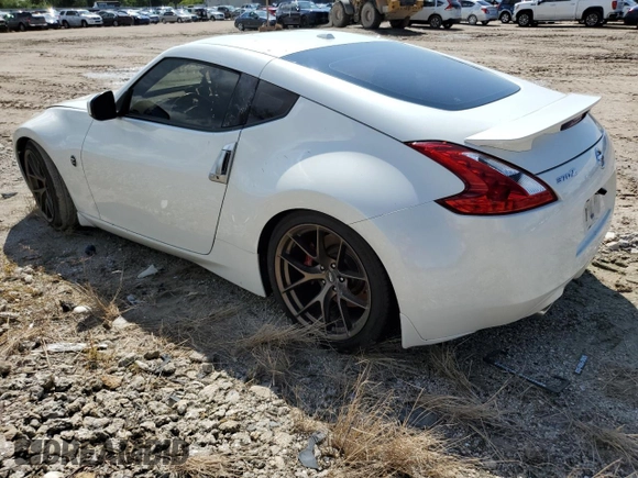 2014 Nissan 370Z Touring with VIN JN1AZ4EH0EM636520, listed as a Copart auction lot 73661434 with 0 mi miles and Salvage Title. Bid and sale history available at carsss.com. Image 2.