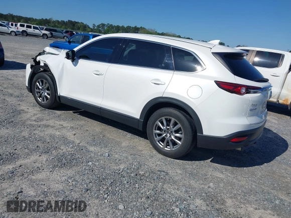 2019 Mazda CX-9 Touring z VIN JM3TCACY3K0333931, wystawiony jako IAAI lot #41968519 z przebiegiem 102 992 mil mil oraz . Historia ofert i sprzedaży dostępna na DreamBid. Obrazek 3.