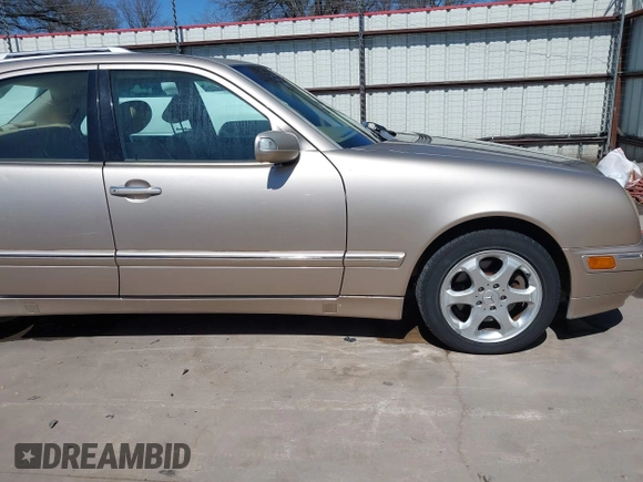 2002 Mercedes-Benz E-Class with VIN WDBJF65J42B394017, listed as a IAAI auction lot 41706917 with 188,883 mi miles. Bid and sale history available at carsss.com. Image 20.