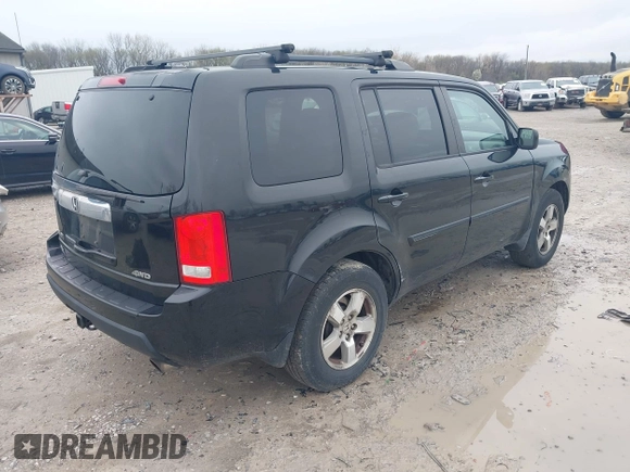 2011 Honda Pilot EX-L with VIN 5FNYF4H6XBB004269, listed as a IAAI auction lot 41947036 with 184,390 mi miles and . Bid and sale history available at carsss.com. Image 4.