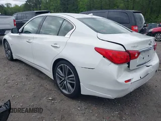 2014 Infiniti Q50 Premium with VIN JN1BV7AP3EM674807, listed as a IAAI auction lot 42003949 with 138,454 mi miles. Bid and sale history available at carsss.com. Image 3.